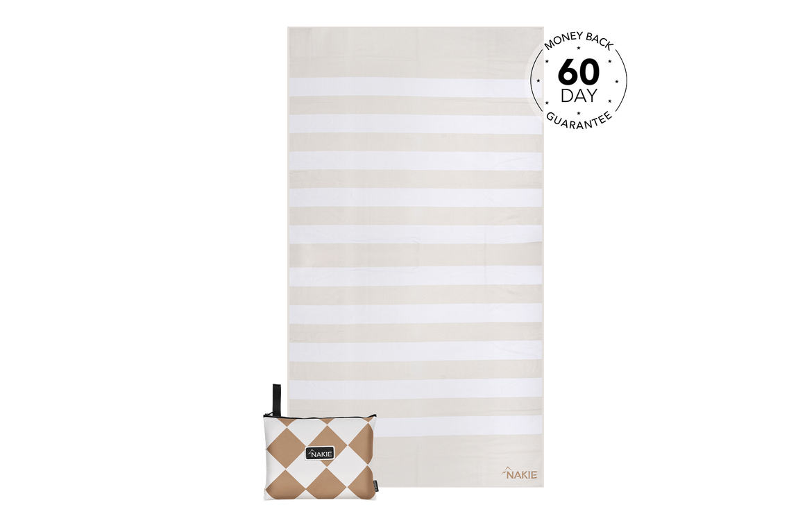 Beige and white striped beach towel with matching diamond-patterned carrying pouch and black handle.